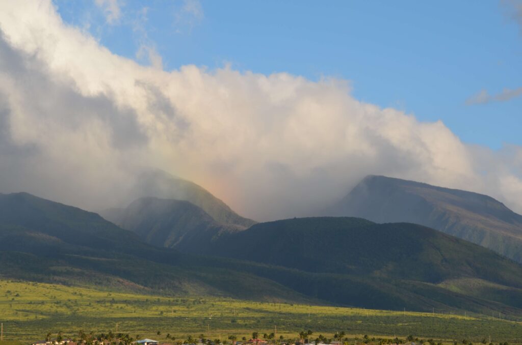 Mountains with a rainbow over them in Maui Hawaii