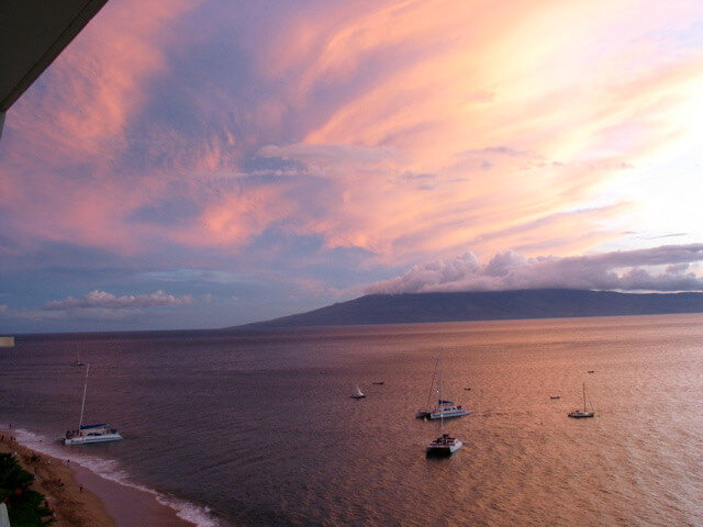 Sunset view with catamarans and pink skies in Kaanapali, Maui, Hawaii