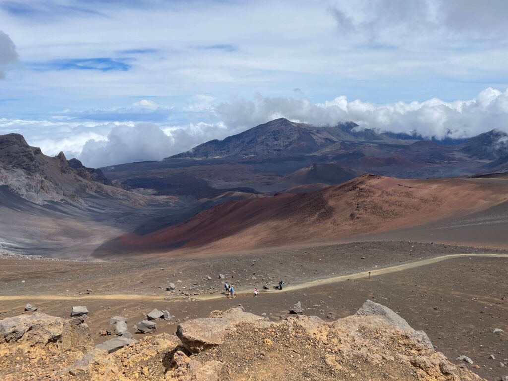 View of hikers on the Sliding Sands Trail at Haleakala National Park, Maui, Hawaii.