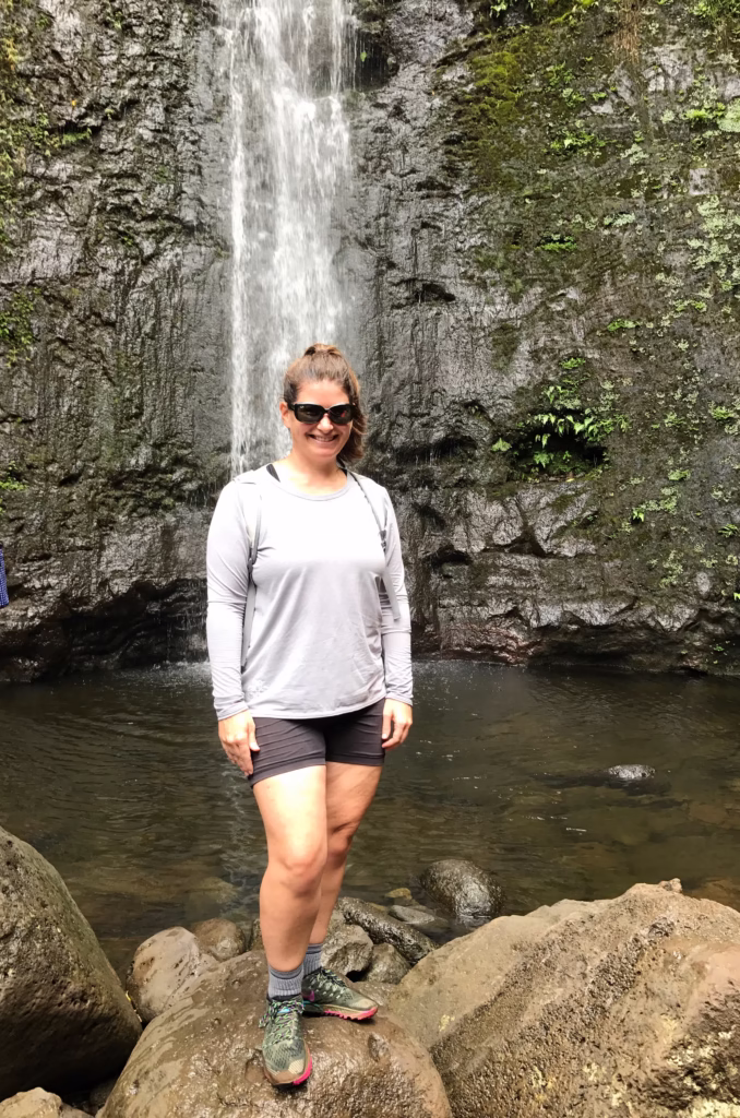 Woman standing in front of Manoa Falls