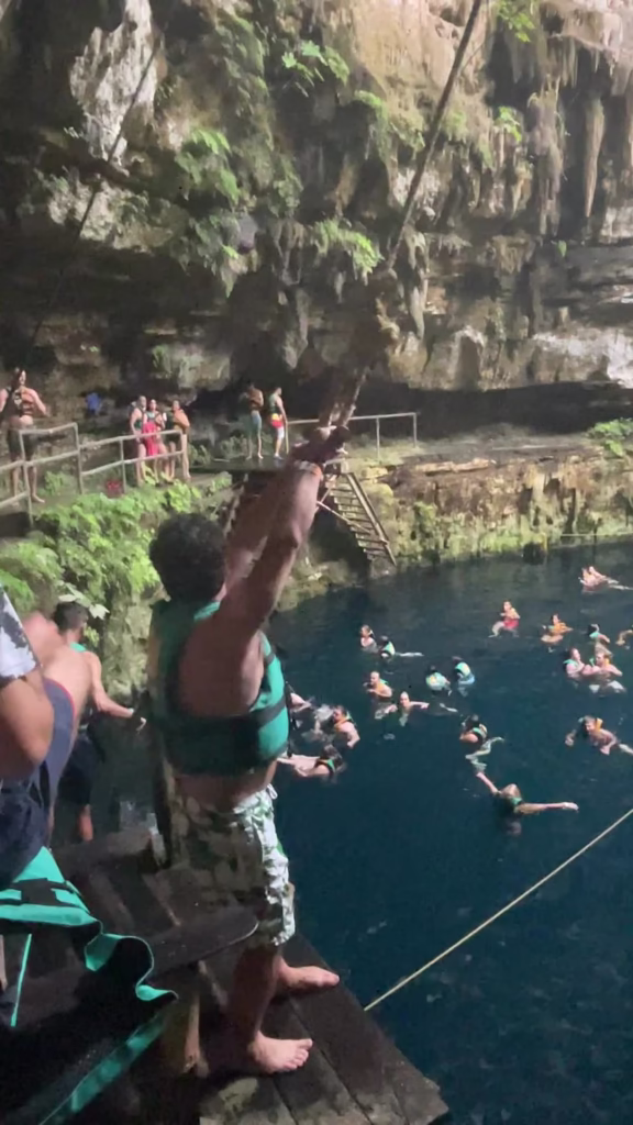Rope swing Tarzan style at Cenote