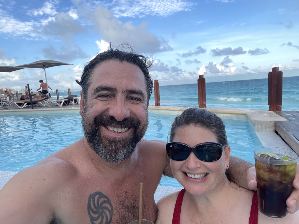 Couple in the pool at the Oleo Cancun Playa