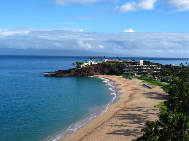 View from above Kaanapali Beach with Black Rock at the end.