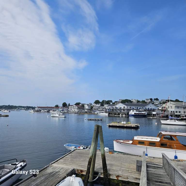 Boothbay Harbor Restaurants - cover image of harbor with fishing vessels taken from the dock.