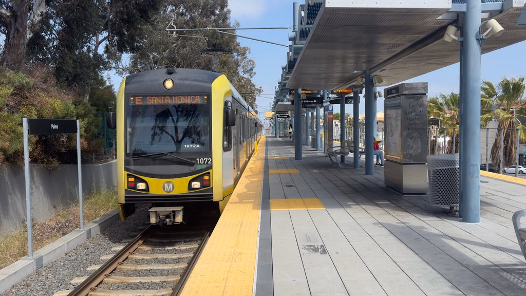 LA Metro E line pulling into the station heading to Santa Monica.